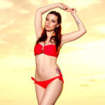 First pic of Elizabeth Marxs loses her red bikini on the beach at sunset