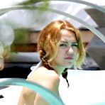 Fourth pic of Miley Cyrus sexy in bikini poolside shots