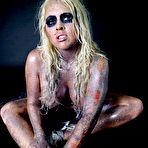 First pic of Big racked blonde model Angel Vain with shining body fingers her pink hole