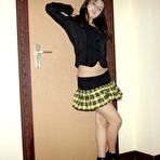 First pic of Seductive brunette posing anked