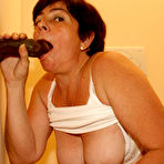 Second pic of and then a big black cock came through the hole