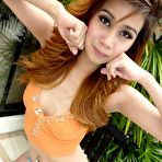 Fourth pic of Naughty Thai girl doing a slow strip tease | Asian Porn Times