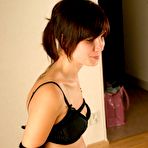 First pic of Bondage Pictures - Elisabet is wearing black underwear and she is barfoot. She is harness tied and then ring gagged. We