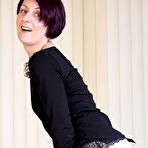 Third pic of Naughty housewife stripping and teasing