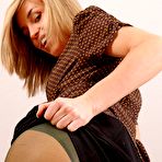 First pic of Sexy MILF secretary looks amazing in her dark pantyhose layers as she slowly strips out of her office outfit. (Melanie) brought by Layered Nylons