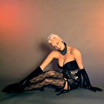 Third pic of Busty Brigitte Nielsen shows deep cleavage photoshoot