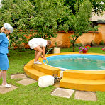 First pic of Rich babes flash their expensive white stockings in a fully-clothed cum-splattered outdoor orgy