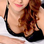 First pic of Naughty redhead chick Sabina Moore loses off black lingerie and sliding dildo in and out the nub