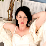 Third pic of Long stockings legs of Victoria Ross are stretched when she is worshipping her nice beaver