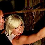 First pic of Blonde babe suffers in dark dungeon