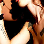 Second pic of Inked emo tart Indigo Augustine enjoys oral sex before mounting her man for a hardcore pounding.