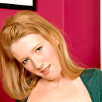 Third pic of Teenager with red hair Mya Lynn strips and spreads pussy lips and also masturbates