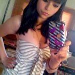 First pic of Sexy amateur honey displaying her round breasts