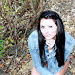 Third pic of Naughty raven babe Freckles exposes her sexy ass as well as her boobs in woods