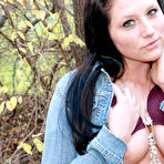 Fourth pic of Naughty raven babe Freckles exposes her sexy ass as well as her boobs in woods