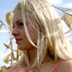 Fourth pic of Blonde tease Skye Model lifts her skirt and shows her ass in a tiny thong