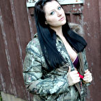 Second pic of Turned on dark haired Freckles shows her hot booty outdoors in thong and enjoys