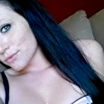 Second pic of Sexy ass brunette hottie in black provocative lingerie Freckles poses on her couch