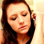 First pic of Dark haired hottie Freckles teases in black lingerie and strips for the webcam