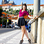 Third pic of Sultry brunette Serena Wood is teasing with her erotic upskirtng in the street