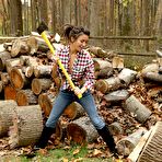 First pic of Sexy and hot brunette Daisy Summers shows off her hot solo outdoor by the chopped woods