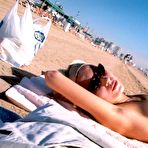 Third pic of Sun-burned well-bodied chick doesn't suspect of being shot on spy camera