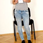 First pic of Absolutely naked bimbo Candy Sweet is stretching widely uncovering the clean shaved beaver