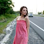 Fourth pic of Enticing teen Anita E reveals her silky body outdoors in a forest and by the side of the road.