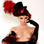 First pic of Extravagant topless brunette Tori Black shows her cute ass in red panties then bares it