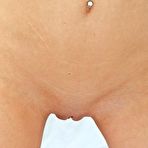 Fourth pic of Lewd brunette teen Susana C again and again sliding her fingers into the nub