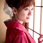 Fourth pic of Yuna Asami wearing a beautiful traditional dress covering her big tits