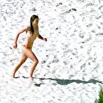 First pic of Elizabeth Hurley caaught topless on St. Barts beach paparazzi shots