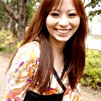 Fourth pic of Kinky Asian teen Shiho Goto is flashing the black panty up skirt on the bench