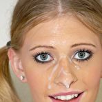 Second pic of Teen looking blonde Allie James is playing with glory hole cock and making it explode