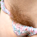 Second pic of All natural Laney flirting and peeing outdoors in nature at PinkWorld Blog