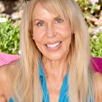 First pic of Cutest blonde milf Erica Lauren entertains by rubbing her nub and getting orgasm outdoor
