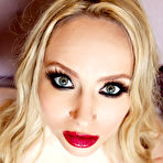 First pic of Bosomy blonde milf Aiden Starr taking off her pink lingerie and spreading the slits