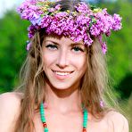 First pic of Cute blonde darling Kesia Nubiles is posing naked outdoor in this popular softcore gallery.