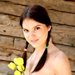 Third pic of Naked Amateur Posing with Flowers