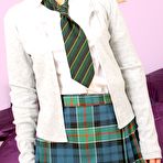 First pic of Shy schoolgirl Emma B in snow white stockings strips naked and palms her pussy