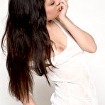 Third pic of Brunette in white blouse Rebecca Tun is demonstrating the nice trimmed pussy