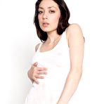 Third pic of The brunette teen Rebecca Tun&rsquo;s body with hairy pussy is covered with sheer top