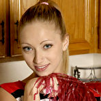 First pic of Cheerleader Adel Sharpe shows her tiny boobs and then toys her snatch in the kitchen