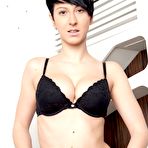 Fourth pic of Busty brunette Nicoleta Emilie slides out of lingerie and touches herself for an orgasm