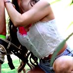 Third pic of Man catches this sassy bimbo Bridget Bond outdoor and diddled her asshole in the yard