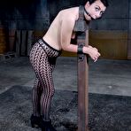 Third pic of SexPreviews - Olivia Fawn is strap bound to wooden polie made to orgasm