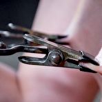 Second pic of SexPreviews - Jessica Kay assistant is bound in metal and ass spanked red