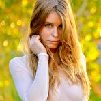 Third pic of Bethanie Skye flaunts her ass and sweet tits in a public park for this sexy softcore gallery.