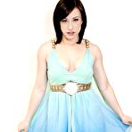 First pic of Sexy doll Jennifer White turns back to camera, lifts dress up and shows the bun