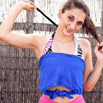 Second pic of Tan amateur cutie Alba teasing with exercise band at PinkWorld Blog